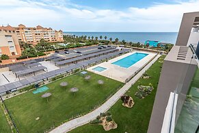 Beachfront Views and Poolside Stay