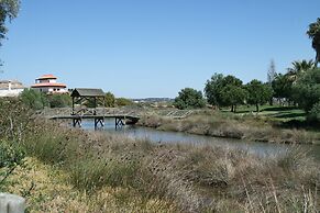 Golf & Riverside Apartment in Isla Canela