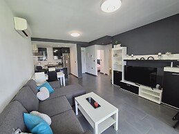 Garden-view Flat in Punta Prima