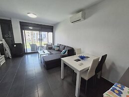 Garden-view Flat in Punta Prima