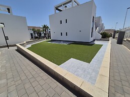 Garden-view Flat in Punta Prima
