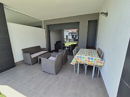 Garden-view Flat in Punta Prima