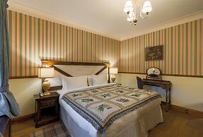 The Whispering Pine Lodge