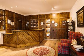 The Whispering Pine Lodge