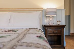 The Whispering Pine Lodge