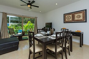 Condos Perfectly Situated Between the Beach & Tulum Town by Stella Ren
