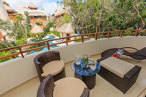 Condos Perfectly Situated Between the Beach & Tulum Town by Stella Ren