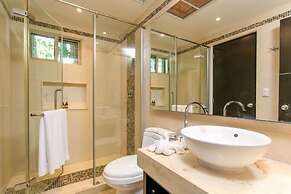 Condos Perfectly Situated Between the Beach & Tulum Town by Stella Ren