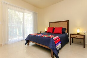 Condos Perfectly Situated Between the Beach & Tulum Town by Stella Ren