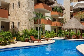 Condos Perfectly Situated Between the Beach & Tulum Town by Stella Ren