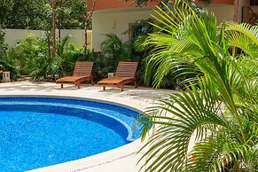 Condos Perfectly Situated Between the Beach & Tulum Town by Stella Ren