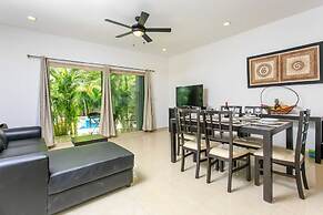 Condos Perfectly Situated Between the Beach & Tulum Town by Stella Ren