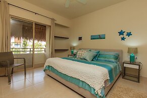 Condos Perfectly Situated Between the Beach & Tulum Town by Stella Ren