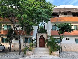 Condos Perfectly Situated Between the Beach & Tulum Town by Stella Ren
