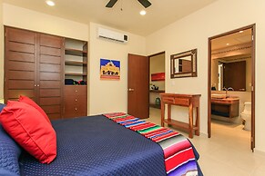 Condos Perfectly Situated Between the Beach & Tulum Town by Stella Ren