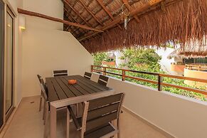 Condos Perfectly Situated Between the Beach & Tulum Town by Stella Ren