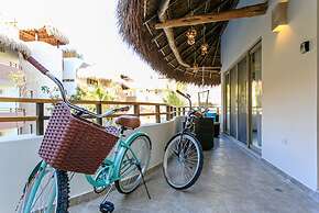 Condos Perfectly Situated Between the Beach & Tulum Town by Stella Ren