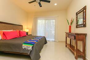 Condos Perfectly Situated Between the Beach & Tulum Town by Stella Ren