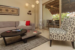 Condos Perfectly Situated Between the Beach & Tulum Town by Stella Ren