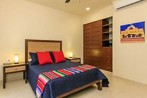 Condos Perfectly Situated Between the Beach & Tulum Town by Stella Ren
