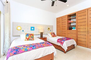 Condos Perfectly Situated Between the Beach & Tulum Town by Stella Ren
