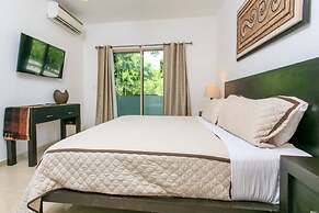 Condos Perfectly Situated Between the Beach & Tulum Town by Stella Ren