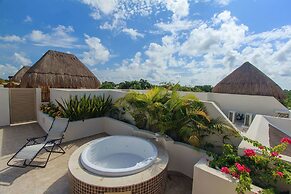 Condos Perfectly Situated Between the Beach & Tulum Town by Stella Ren