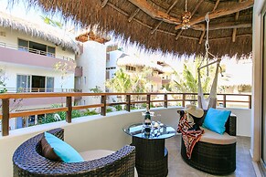 Condos Perfectly Situated Between the Beach & Tulum Town by Stella Ren