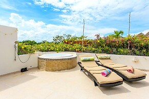 Condos Perfectly Situated Between the Beach & Tulum Town by Stella Ren