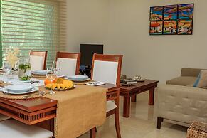 Condos Perfectly Situated Between the Beach & Tulum Town by Stella Ren