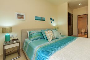 Condos Perfectly Situated Between the Beach & Tulum Town by Stella Ren