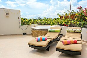 Condos Perfectly Situated Between the Beach & Tulum Town by Stella Ren