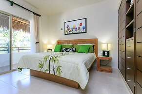 Condos Perfectly Situated Between the Beach & Tulum Town by Stella Ren