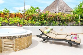 Condos Perfectly Situated Between the Beach & Tulum Town by Stella Ren
