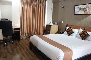 WE Hotel and Suites