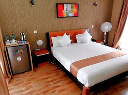 WE Hotel and Suites