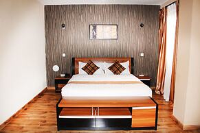 WE Hotel and Suites