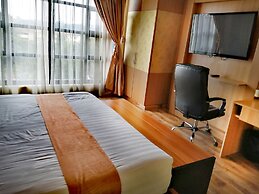 WE Hotel and Suites