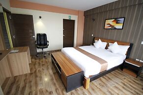 WE Hotel and Suites