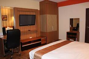 WE Hotel and Suites