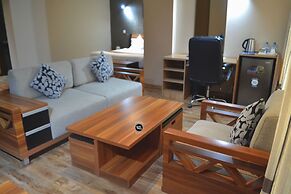 WE Hotel and Suites