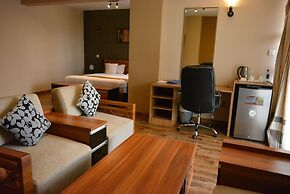 WE Hotel and Suites