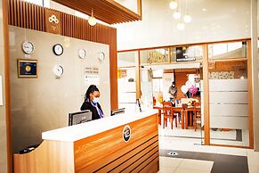 WE Hotel and Suites