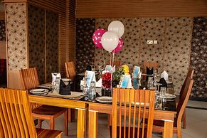 WE Hotel and Suites