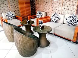 WE Hotel and Suites