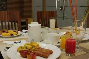 WE Hotel and Suites