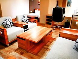 WE Hotel and Suites