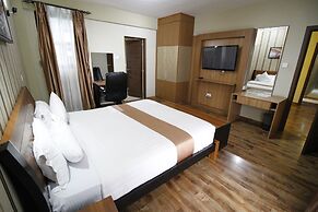 WE Hotel and Suites