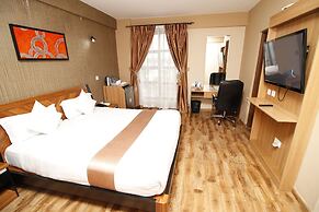 WE Hotel and Suites