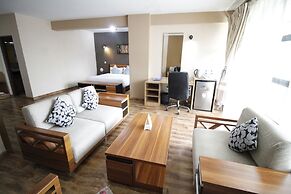 WE Hotel and Suites